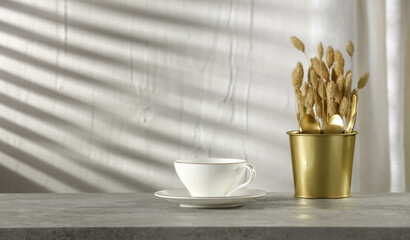 Poster - Fresh hot coffee in cup and wall background. 