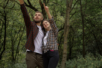 a couple in love outdoors in the forest