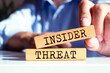 Wooden blocks with words 'Insider Threat'. Business concept