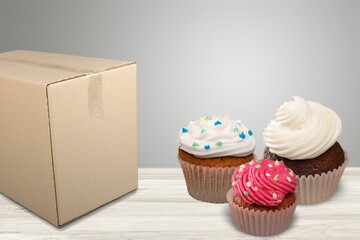 Wall Mural - Three Cup Cake and Box. Tasty sweet food