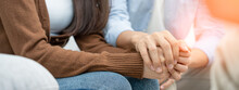 Couple Hold Hands To Support Each Other While Discussing Family Issues With A Psychiatrist. Husband Encourages Wife  Suffers Depression. Psychological, Save Divorce, Hand In Hand Together, Trust, Care