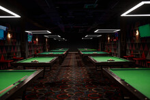Interior of billiard club with pool table for game