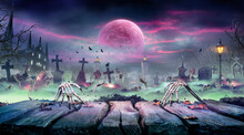 Halloween - Zombie Rising On Wooden Table - Skeletons Party In Graveyard At Spooky Nights With Blood Moon