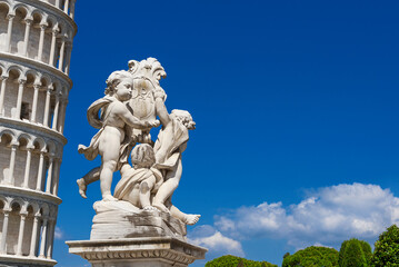 Wall Mural - Fontana dei Putti (Fountain with Angels), erected in 1756 in front of the famous Leaning Tower of Pisa (with copy space)