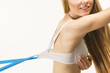 © Voyagerix - Woman wearing too big bra, loose band