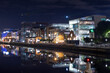 Skyline of the offices on the shoreline of the 'River Liffey' in Dublin illuminated at night