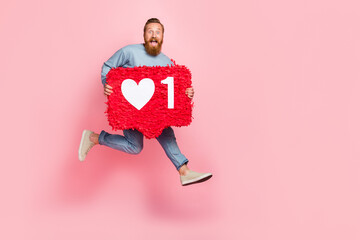 Full length photo of crazy handsome guy jumping rush arms hold huge like collage isolated on pink color background