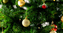 Image Of Close Up Of Christmas Tree With Red And Gold Baubles Decoration