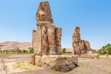 Wall Mural - Luxor, Egypt; September 11, 2022 - A view of the Colossi of Memnon on Luxors west bank, Egypt.