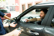 © AntonioDiaz - Driving bribing a police officer for a parking fine