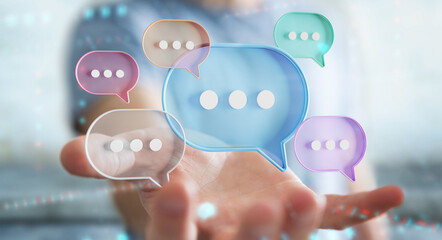 Wall Mural - Businessman using digital speech bubbles talk icons. Minimal conversation or social media messages floating over user hand. 3D rendering