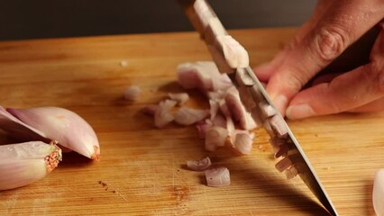 Wall Mural - cutting shallot on wooden chopping board