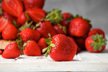 Wall Mural - Fresh Strawberry on light background Close up. Selective focus. useful product