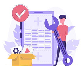 App development. A programmer developer creates an application on the phone. A man holding a wrench