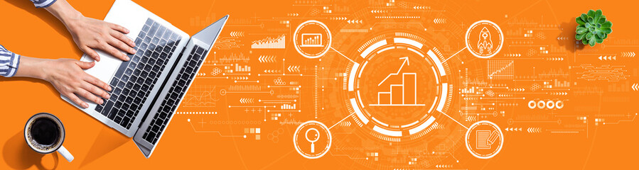 Business growth analysis with person using a laptop computer