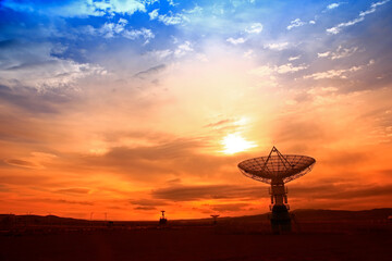 Wall Mural - the silhouette of a radio telescope observatory