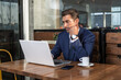 © Juan Algar - Male executive browsing data on netbook