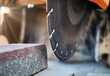 © Anoo - The circular diamond saw cuts concrete paving slabs. Concrete cutting machine close-up.