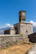 Clock Tower in Gjirokaster Citadel surrounded by ancient ruins, attraction in Albania, Europe