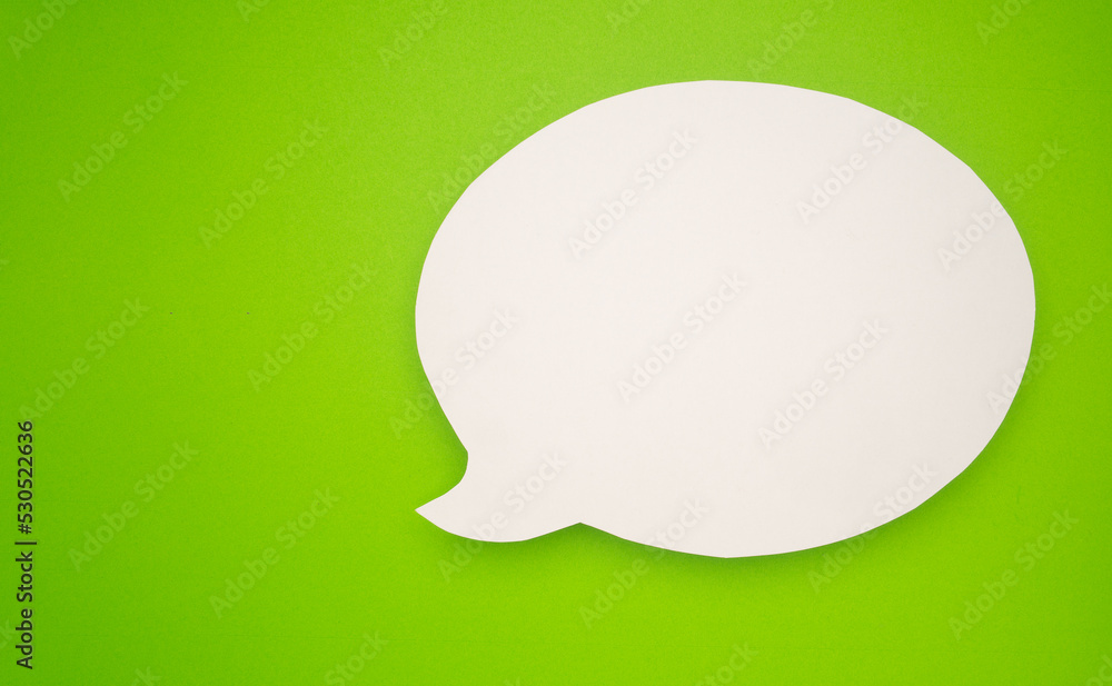 A blank white speech bubble over a light green background Stock Photo ...