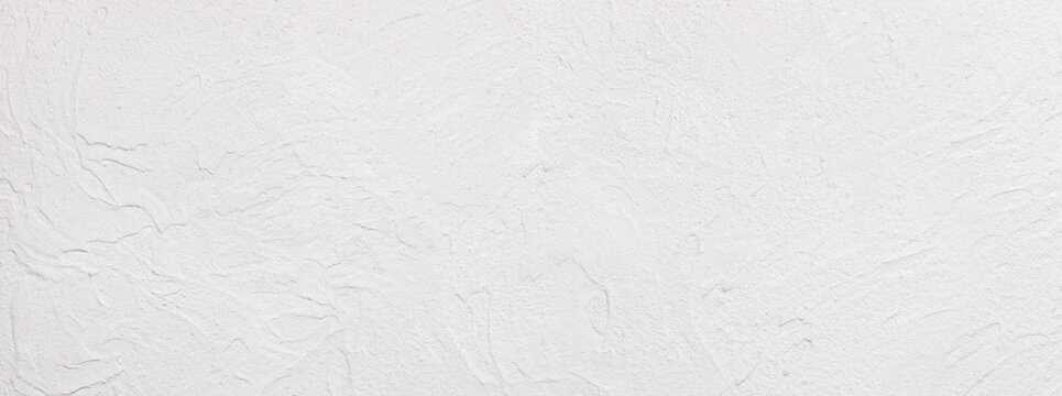 Fototapete - Mediterranean uneven lime plaster limestone wall surface -  handmade texture of white concrete wall  - background, panorama