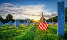 American Flags Placed By Gravestones In Fort Logan Cemetery