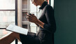 © Jacob Lund - Woman reading a magazine and having coffee