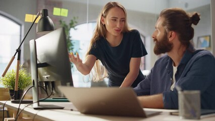 Aufkleber - Portrait of Two Young Entrepreneurs Talking, Using a Computer to Discuss a Corporate Project. Stylish Managers Work on Financial and Marketing Projects in a Creative Agency.