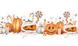 Halloween seamless border. Watercolor texture illustration with pumpkins, candy, candles, bones and garlands. Cute halloween decoration for your design.