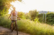 © pikselstock - Father teaching his son how to ride a bicycle