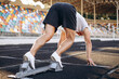 © Petro - Man sprinter training at the stadium on running track