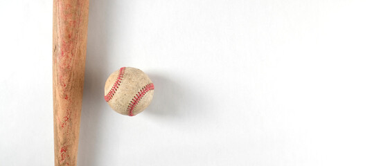 Poster - Baseball bat with ball isolated on white background for minimalism sports decoration with copy space.