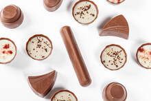 Top View Assorted Chocolates On A White Background