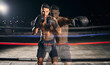 © Beaunitta V W/peopleimages.com - Fitness, boxing and boxer in the ring training, exercise and punching with energy and power in a workout portrait. Action, performance and healthy man fighting to be a young sports champion athlete