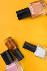 Poster - Nail polish on yellow background