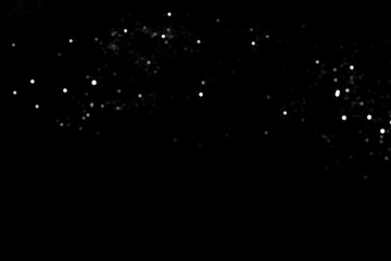 Wall Mural - white gray blurred bokeh lights on black background. glitter sparkle stars for celebrate. overlay fo