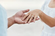 © Jesse B/peopleimages.com - Engagement proposal, couple hand and marriage ring on vacation at beach, travel wedding and love celebration on sea vacation in Bali. Man and woman with jewelry for commitment at the ocean in summer