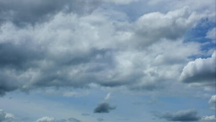 Wall Mural - blue sky white clouds. puffy fluffy white clouds. cumulus cloud cloudscape timelapse. summer blue sk