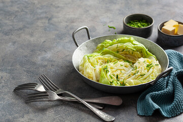 stewed steamed cabbage with butter, healthy vegetarian food