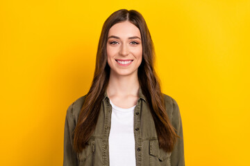 Poster - Photo of satisfied young lady toothy beaming smile look camera isolated on yellow color background