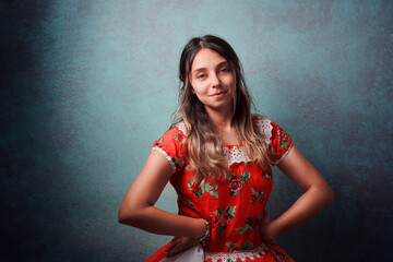 Wall Mural - young chilean woman with national dress or folk costume to celebrate national holidays portrait 