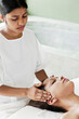 © Matthew Wakem - Woman Receiving Facial at a Spa. Heritance Kandalama, Dambulla, Sri Lanka.