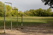 © Oleg Opryshko - old sports ground with a horizontal bar in the park