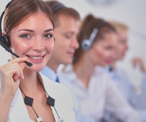 Wall Mural - Attractive Smiling positive young businesspeople and colleagues in a call center office