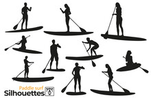 Isolated Silhouettes Of Paddle Surfers In The Sea.