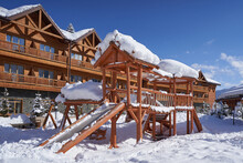 Wooden Playground For Children Under The Snow In Winter