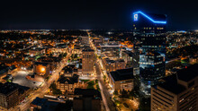 Aerial Photograph Of The Lexington, Kentucky Skyline At Night With The City Alite.