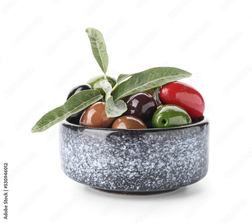 Bowl with different olives on white background