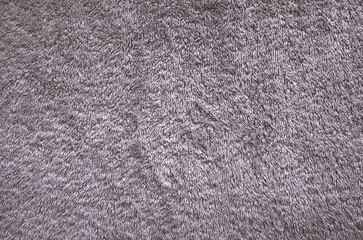 violet gray towel cloth texture background. fluffy fabric textile backdrop.