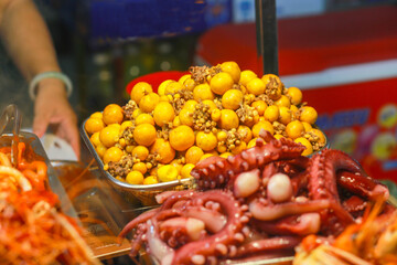 young chicken egg soiled and octopus in ho thi ky street food, ho chi minh city